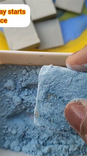 Wet Slate Cube coated in cambrian clay powder