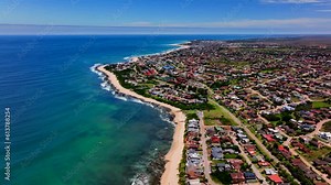 South Africa JBAY Jeffreys Bay aerial drone town homesmost stunning white sand beach epic surf wave saturated aqua blue rugged reef coastline daytime WSL Corona Open Supers Boneyard summer circling