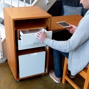 The Ludovico Office converts from a small cabinet into a functional office workspace! Three different panel finish options in stock now. | Expand Furniture