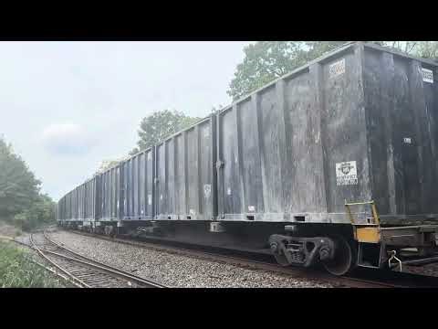 NS 1103 SD70ACe leads NS 62V with a friendly crew at Piscataway