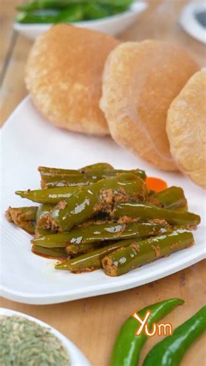 Yum on Instagram: "Spice up your mealtime with this tangy, hearty Mirchi Bhajji packed with traditional, satisfying flavours🌶️ #mirchibhajji #tasty #spicy #tangy #lunch #dinner #delicious #foodreels #homemade #yum #recipe #reels"