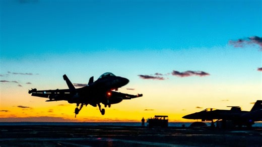 Watch intense night aircraft carrier landings and takeoffs