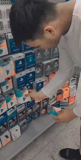 Gift Card Selection in Retail Aisle