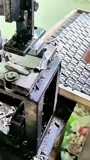 Metal Shaping Process as Press Lowers Producing Smooth and Even Pieces