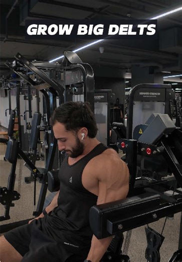 Time to stop gatekeeping the shoulder gains. 🤫 Sitting backwards on the Hammer Strength lateral raise is the ultimate cheat code for capped delts. It locks your torso in place so you can’t swing the weight, forcing the medial delt to do 100% of the work. Try this and feel your delts grow to the 🌔 #shoulders #delts #bodybuilding #lateralraise #gymtips