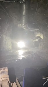 Underground loading of a truck. Excavated material from tunnelling projects or underground mining needs to be transported out of the tunnel. A common method is to use loaders to load the material onto trucks, which then transport it to the surface. Follow us at tunnel.engineering Reference: LnkdIn Hooman Askari Tktk Faultfinder0 #tunneling #mining #excavation #undergroundmining #loader #trucktransport #construction #materialhandling #engineering #geotechnical #safetyfirst #oretransport #rockhaul