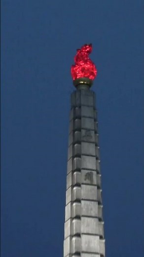 What is the Juche Tower in North Korea's Flame Made of?