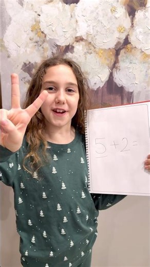 Sierra teaches Rhia addition by counting on numbers
