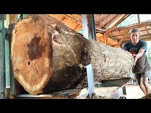 The process of converting logs into beams and sheets in a sawmill