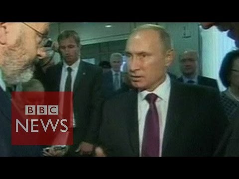 BBC's Sweeney catches Putin at talks - BBC News
