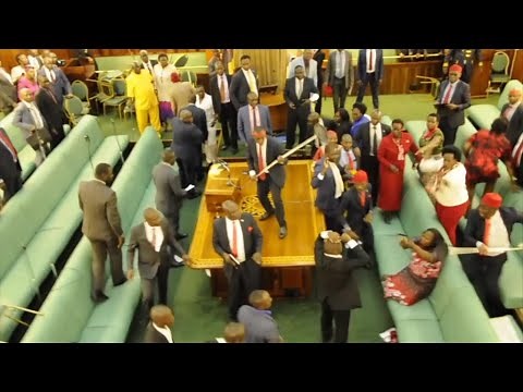 Ugandan MPs fight in parliament for second day over presidential age limit