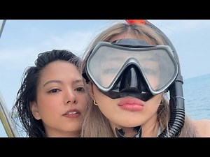 Beautiful woman in latex full face gas masks and scuba doving gear dresses