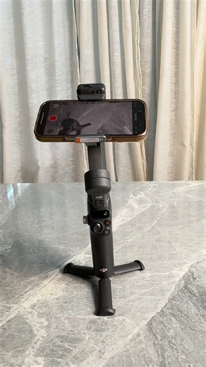 Vinita&Shubham on Instagram: "Best Smartphone Gimbal 2026? DJI Osmo Mobile 7P Review! 📱 #dji #osmomobile7p #gimbal #tripod #viral"
