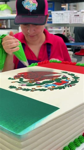 Cake Girl Prints on a Sheet Cake using her Big Blue XL Food Printer