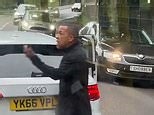 Angry bus driver and motorist engage in heated argument in the middle of the road
