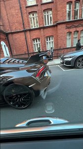 Powerful Ferrari driving on my side in central London