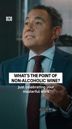 Is it socially appropriate to drink non-alcoholic wine at work?