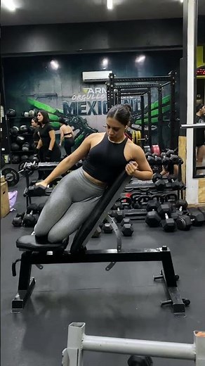 Recline bench single arm dumbbell lateral raises