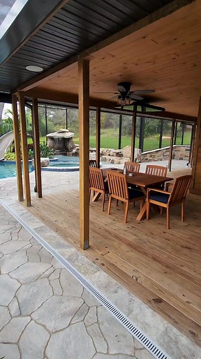 69K views · 1K reactions | Insane Pool recently completed in Central Florida. This backyard has a huge grotto, a waterslide, a big spa, a swim-up bar, a screened enclosure, a fire pit, and a lifeguard stand. #insanepools #lucaslagoons #pool #poolbuilders #backyard #luxurylife #waterslide | Lucas Lagoons Design | Facebook