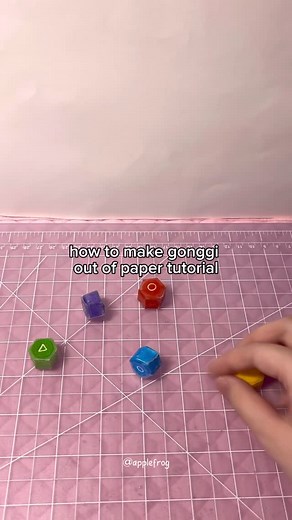 applefrog on Instagram: "diy how to make gonggi out of paper 🔸 full video/other tutorials on my youtube channel applefrog! 💚 #squidgame #squidgame2 #craft #asmr #papercraft #tutorial #diy #howtomake #howto #fyp #gonggi"