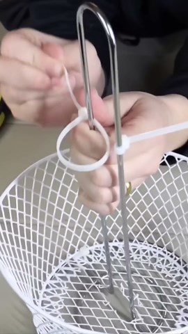 Slide two Dollar Tree baskets on a paper towel holder... 🫢