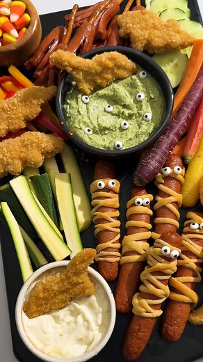 Boo! 👻 A spooky protein snack board in under 30 seconds! Spooky, simple, and so fun to share. Full recipe at https://www.mapleleaf.ca/recipes/halloween-protein-board/ | Maple Leaf Foods