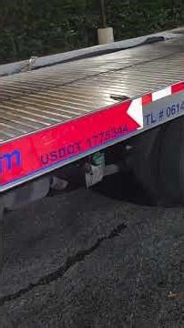 female fow truck driver -basic of operating a flatbed tow truck