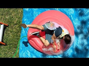 Falling onto a Giant Water Balloon at 12,500fps - The Slow Mo Guys