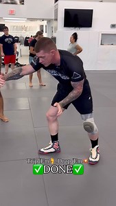 Gravity doesn’t miss—make it your weapon⚡️ Quick foot sweeps that dump opponents fast and rack up easy takedowns💪 No muscle. Just timing, angles, and momentum💯🔥 ✅ Break balance ✅ Trip faster ✅ Win easier From the Over/Under position—simultaneously pull their lat ⬇️ & circularly toward you on the underhook side, as you take a small step with your opposite foot to the outside on the Overhook side. At the same time push straight at their hip from the Overhook & leave your leg out to catch, givin