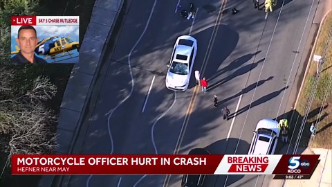Motorcycle officer taken to hospital after crash in The Village, police say