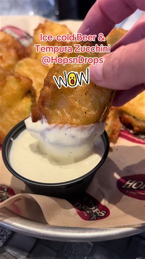 🏈Game day favorites! 🏈 An ice cold growler full of your favorite Hops n Drops beer with a side of Tempura Zucchini. #yummy #gameday #beer #craftbeer #fy