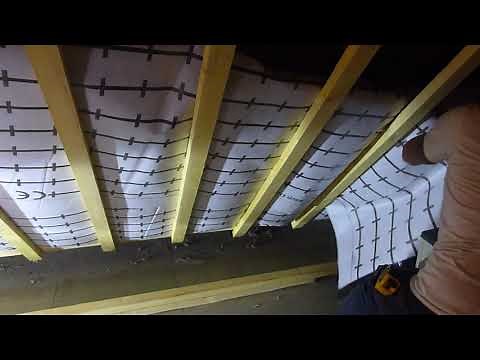 Démonstration d'isolation sous toiture des combles aménagés avec ISOSAC par l'intérieur