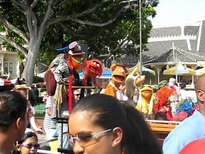 Muppets riding up Main Street Disneyland