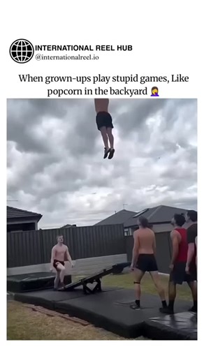 GLOBAL REEL HUB™™ on Instagram: "The post shares a viral video of shirtless men catapulting each other via backyard see-saw, captioned as "stupid games" like "popcorn" popping up, capturing adults reverting to childlike antics for laughs. Quoting an animated Tik Tok on possessive relationship hypocrisy, it contrasts relational absurdities with physical play, blending relatable humor to engage a broad audience beyond the poster's MAGA-focused bio. High engagement (628k views, 109 likes) stems fro