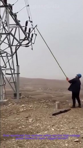 Epic Power Line Maintenance: Using a Long Insulated Pole