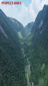 With an average altitude of 1,300 meters, the Wuling Mountain Grand Rift Valley presents a breathtaking display of nature’s grandeur, featuring distinctive landforms, rich biodiversity, and superb natural beauty in Chongqing, southwest China. | People's Daily, China