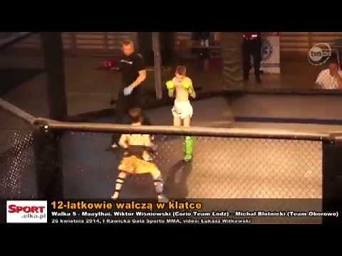 MMA fight in cage. two boys 12 years old! Fight in Poland