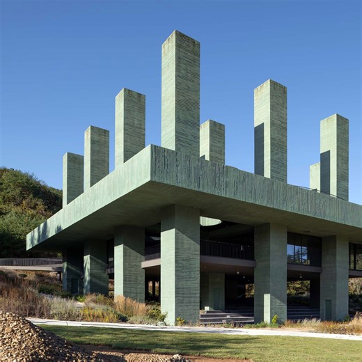 "Obelisk-like" columns rise through Pezo von Ellrichshausen's restaurant for botanical garden