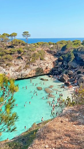 This is my favourite beach on the Island of Mallorca! Caló des Moro is a totally beautiful cove. The beach is gorgeous, especially for the crystal-clear turquoise waters, white sand, and dramatic cliffs (which you have to ramble across to get here. Yeah, you will get sweaty but it’s worth it). Best of all, the beach is located only about 5 kilometers from the town of Santanyí, which we loved and can be reached in your car or by a short hike from the nearby Cala Llombards beach. In fact, do both 