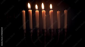 Jewish bronze seven-armed candlestick Menorah for seven candles, symbol of Judaism traditional jewish holiday, concept history, faith and traditions