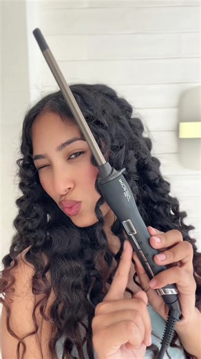 Transform your curls with the Ikonic Hot Wand – the secret to salon-worthy, long-lasting curls every time. Whether you’re going for tight, defined curls or loose waves, this professional tool has you covered! The 10mm Titanium Barrel ensures superior heat conductivity for tighter, long-lasting curls. With digital temperature control (120°C–210°C), you can customize your heat settings for your hair type, while the 360° swivel cord lets you style without any tangles. Plus, the auto-lock feature pr
