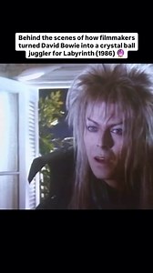 FilmFreeway on Instagram: "Ever wondered how David Bowie handled those crystal ball scenes so effortlessly in Labyrinth?🔮 Bowie wasn’t actually the one doing the juggling - it was Michael Moschen, the renowned juggler and performance artist. In the film, Moschen crouched behind Bowie, out of sight, and out his hands through Bowie’s arms to perform the seamless crystal ball movements. It was a challenging process, requiring close synchronisation between Moschen and Bowie. Credit: @cineatomy #dav