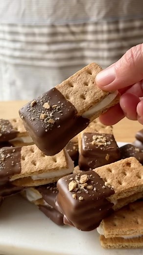 Essential Everyday on Instagram: "S’more Bites 🍫🔥 These are a fun and easy way to enjoy s’mores without a campfire! Plus, they’re easy to make ahead of time for entertaining. You just need Essential Everyday Honey Graham Crackers, Marshmallows and Milk Chocolate Chips. Bookmark the RECIPE below 👇 and click the link in our bio to find Essential Everyday products in a store near you! 🛒 S’MORE BITES (makes 12) 6 sheets Essential Everyday Honey Graham Crackers (24 individual graham cracker piece