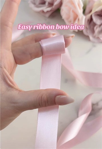 A quick way to tie a pretty bow for gift wrapping — clean, neat, and works every time. #bowtutorial #ribboncraft #giftwrappingideas #wrappinghack #craftproject