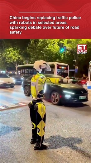 China has started deploying robots to manage traffic, monitor violations and assist with basic road safety duties in select locations, with authorities citing efficiency gains even as videos of robotic traffic control trigger public debate over jobs and safety. #China #robot #roadsafety | ET NOW