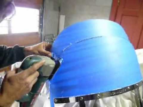 Trim a motorcycle windshield.