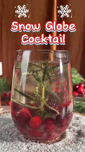 Add a little sparkle to your December sipping. Our Snow Globe cocktail freezes cranberries and rosemary into ice for a stunning holiday touch. Pour in your favorite canned cocktail for the perfect bubbly finish. https://ow.ly/tnju50XFGkE? | Fine Wine & Good Spirits