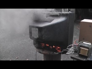 Working TV smoking and on fire