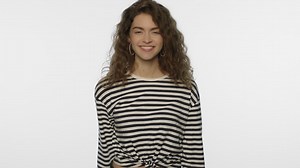 Free stock video - Surprised woman waving hand hi on white background