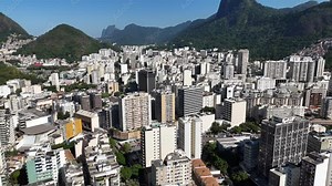 Aerial drone view Rio de Janeiro Brazil South American City Christ the Redeemer statue atop Mount Corcovado and for Sugarloaf Mountain Copacabana